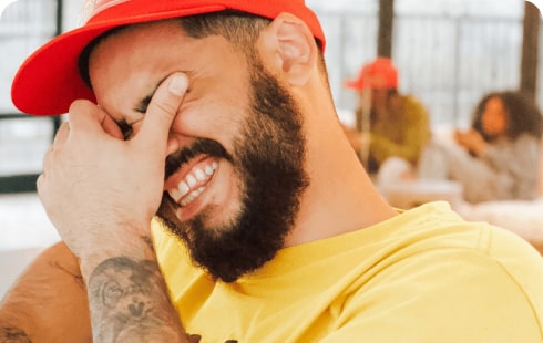 friend laugthing at a buzzer sound playing